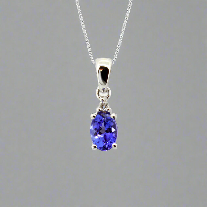 Oval Claw Tanzanite Pendant with Diamonds - 9ct White Gold with 1 x 7x5mm Oval Tanzanite and 1 x Dia &amp; Chain 45cm