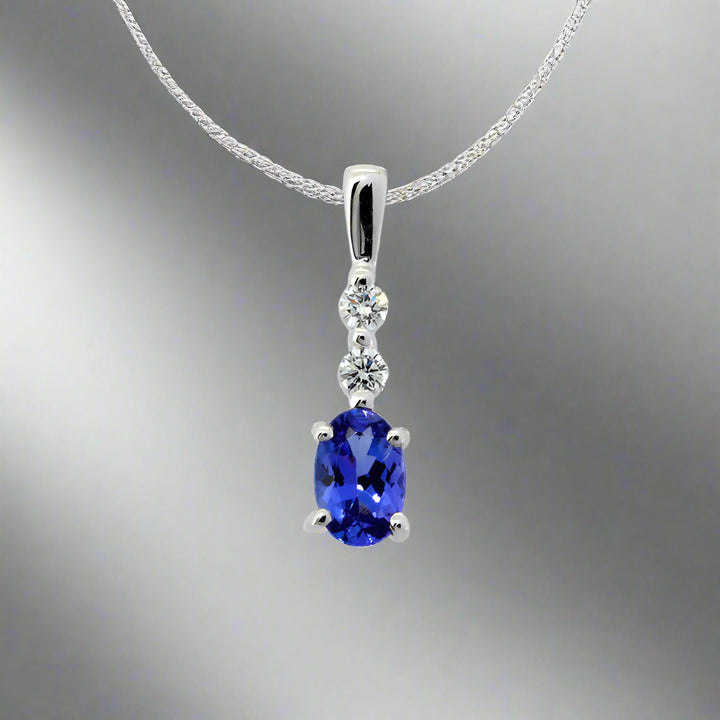 Oval Drop Tanzanite Pendant with Diamonds - 9ct White Gold with 1 x 6x4mm Oval Tanzanite and 2 x Dia &amp; Chain 45cm