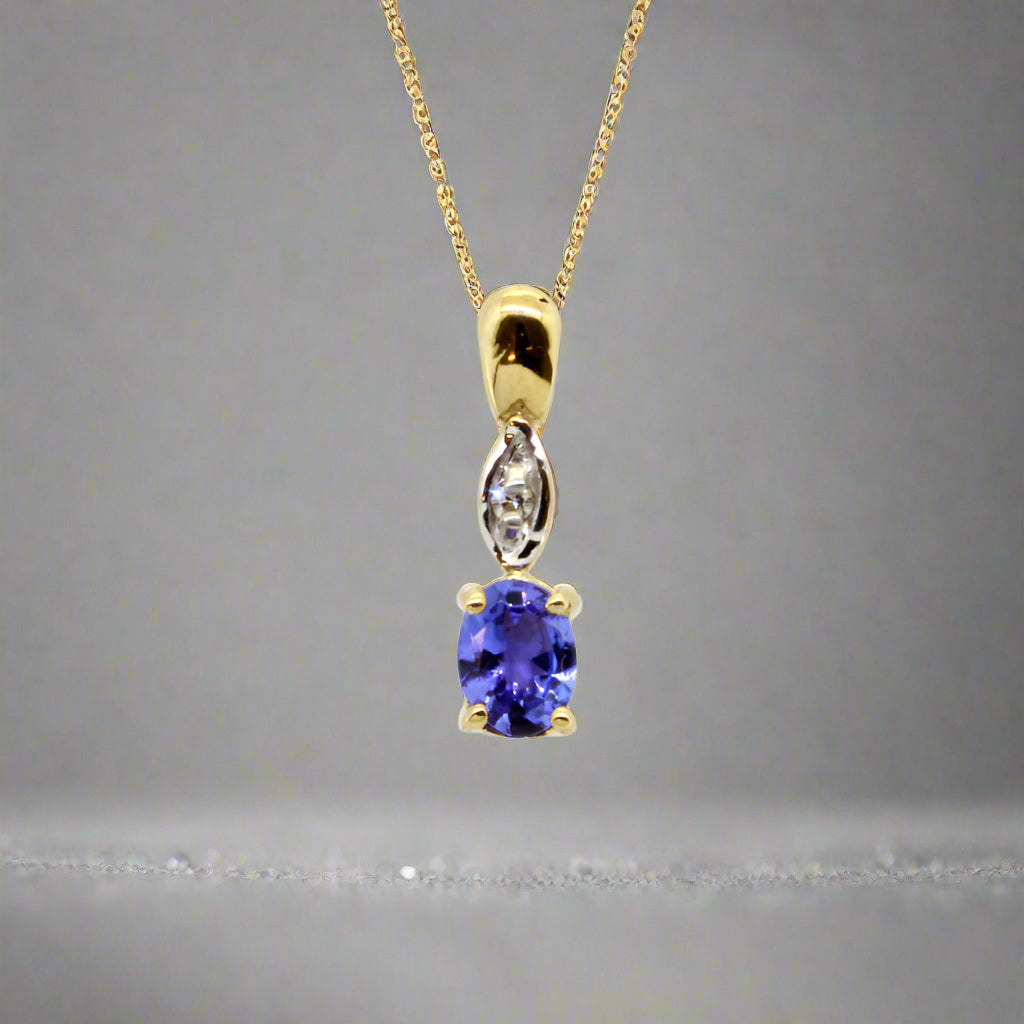 Oval Tanzanite Pendant with Diamonds - 9ct Yellow Gold with 1 x 5x4mm Oval Tanzanite and 1 x Dia &amp; Chain 45cm