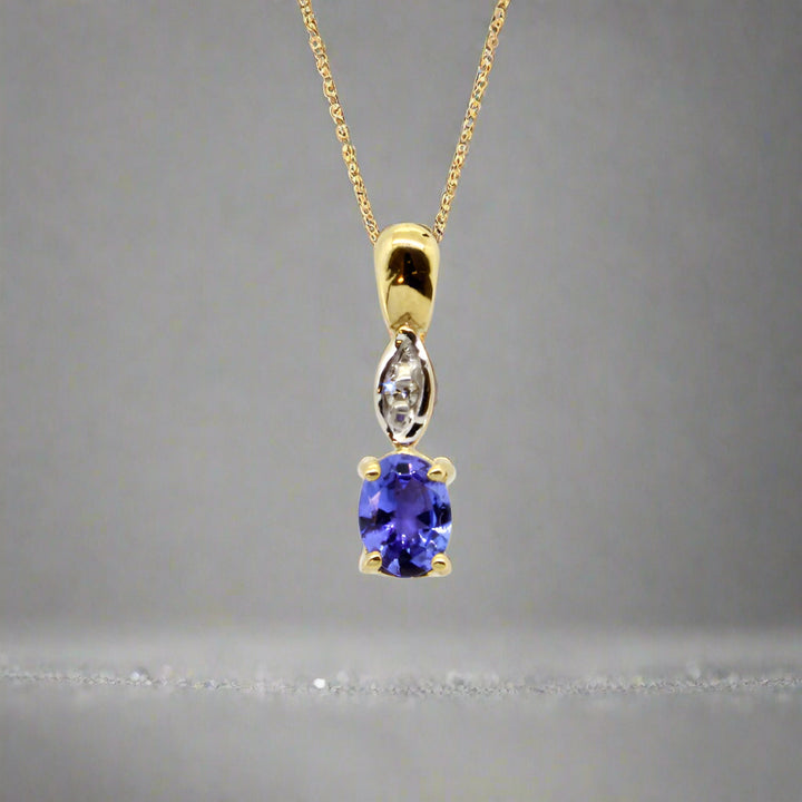 Oval Tanzanite Pendant with Diamonds - 9ct Yellow Gold with 1 x 5x4mm Oval Tanzanite and 1 x Dia &amp; Chain 45cm