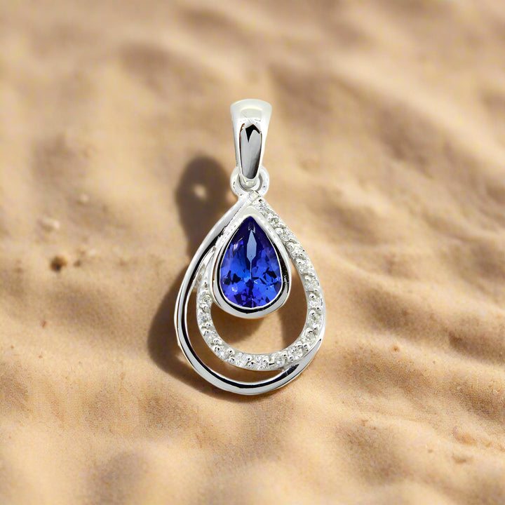 Assymetrical Pear-shaped Tanzanite &amp; Dia Pendant - 9ct White Gold with 1 x 7x5mm Pear Tanzanite and 17 x 0.005ct Diamonds GH/SI &amp; Chain 45cm