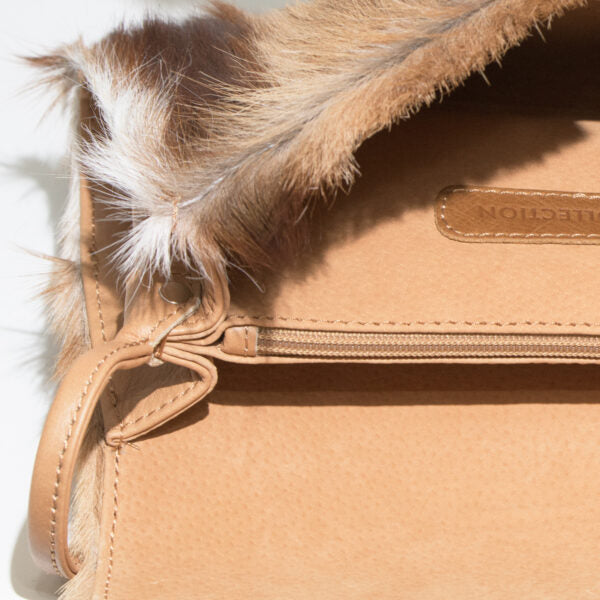 Mira Clutch Springbok Bag