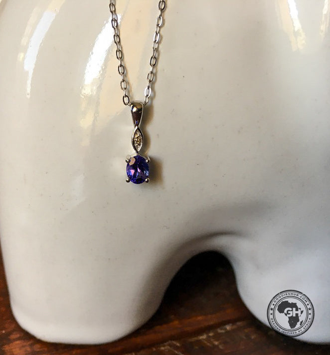 Oval Tanzanite Pendant with Diamond - Silver with 1 x 5x4mm Oval Tanzanite and 1 x Dia &amp; Chain 45cm