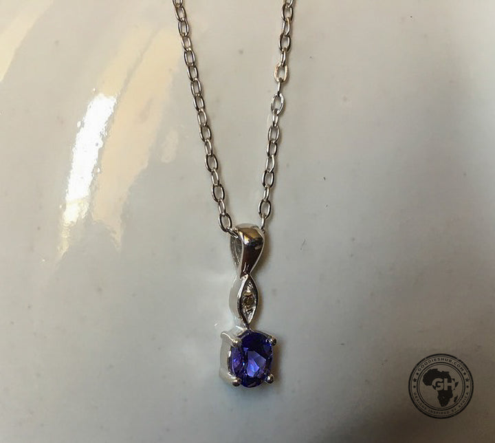 Oval Tanzanite Pendant with Diamond - Silver with 1 x 5x4mm Oval Tanzanite and 1 x Dia &amp; Chain 45cm