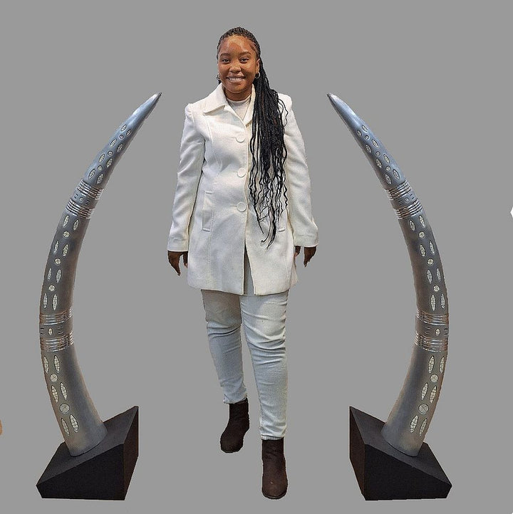 Elephant Aluminium Tusk Pair with Ostrich Eggshell inlay . Mounted on Black wood Stands